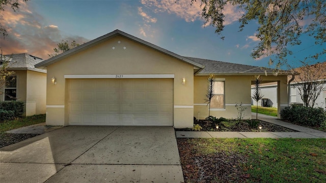 single story home featuring a garage