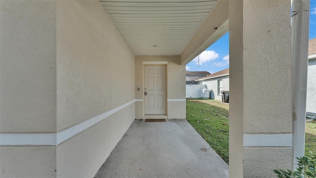 property entrance with a patio