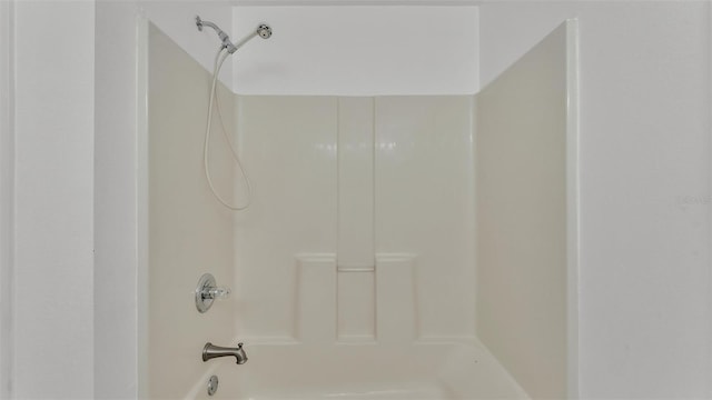 bathroom with shower / bathtub combination