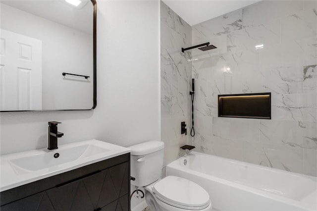 full bathroom with vanity, tiled shower / bath combo, and toilet