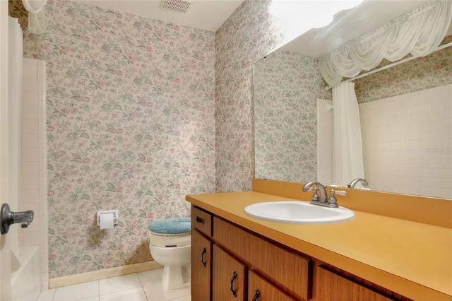 full bathroom with tile patterned flooring, vanity, shower / tub combo, and toilet