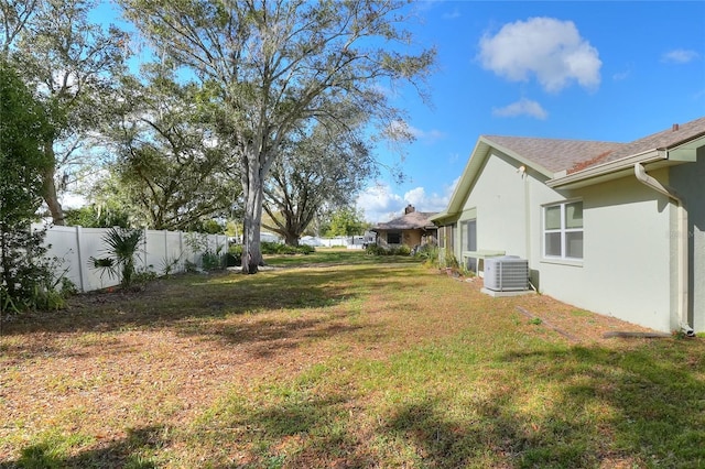 view of yard featuring central AC unit