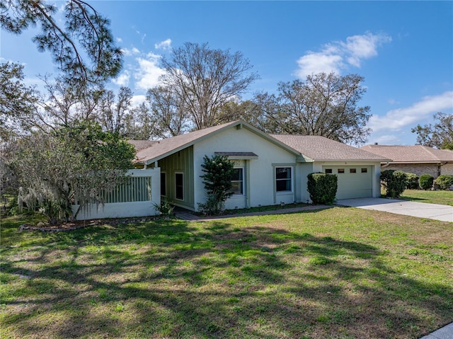 ranch-style house with a front yard and a garage