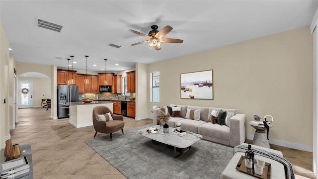 living room with ceiling fan