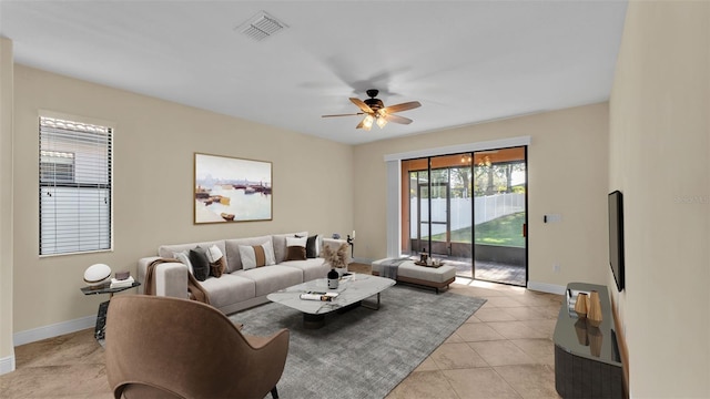 living room with light tile patterned floors and ceiling fan