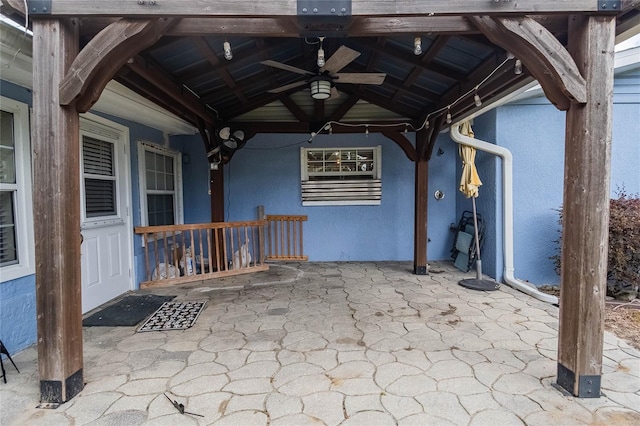 view of patio / terrace with a gazebo and ceiling fan