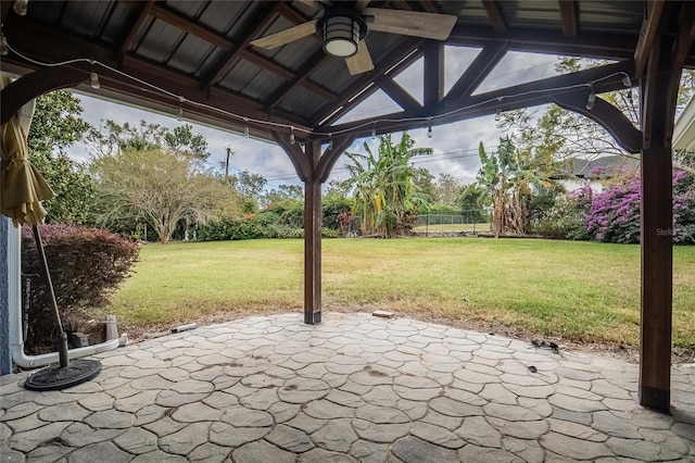 view of patio with a gazebo and ceiling fan