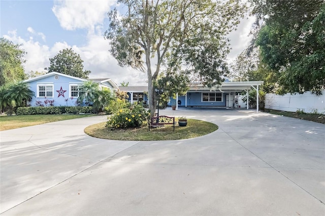 single story home with a carport