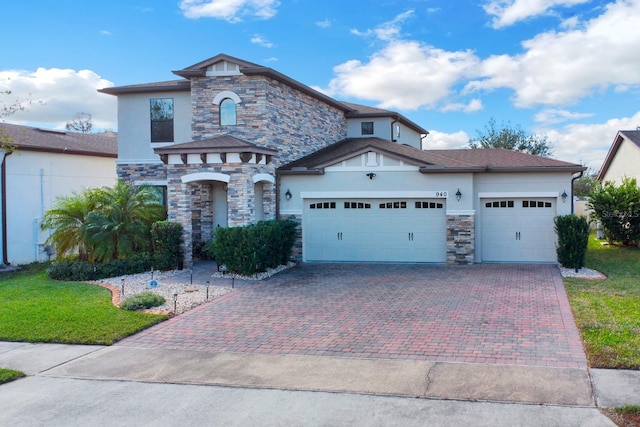 view of front of property with a garage