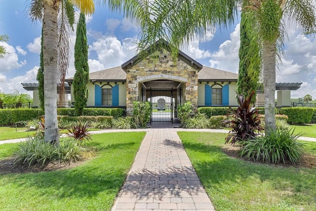 view of front of home with a front lawn