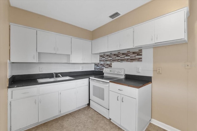 kitchen with white electric range oven, tasteful backsplash, white cabinetry, and sink