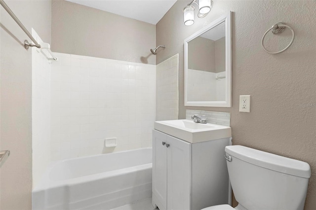 full bathroom with shower / tub combination, vanity, and toilet