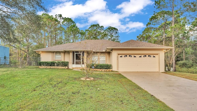 single story home with a front yard and a garage