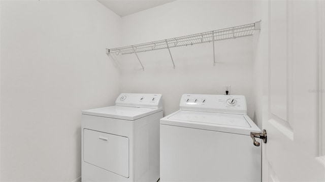 laundry area featuring independent washer and dryer