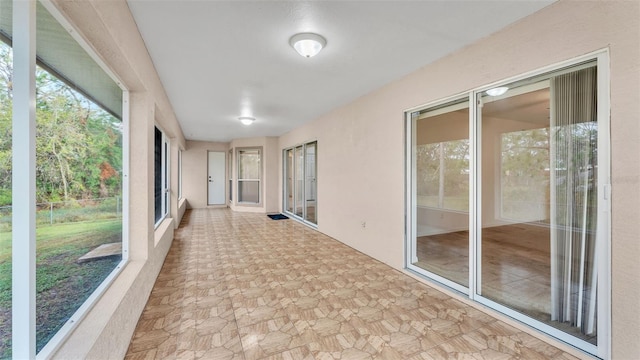 view of unfurnished sunroom