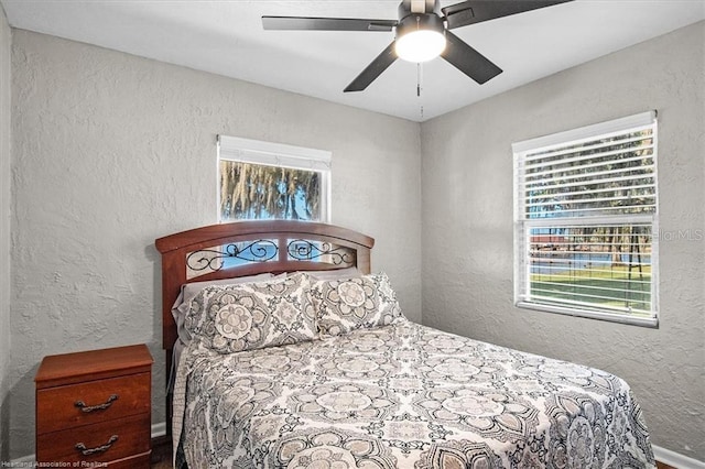 bedroom featuring ceiling fan