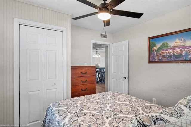 bedroom with a closet and ceiling fan