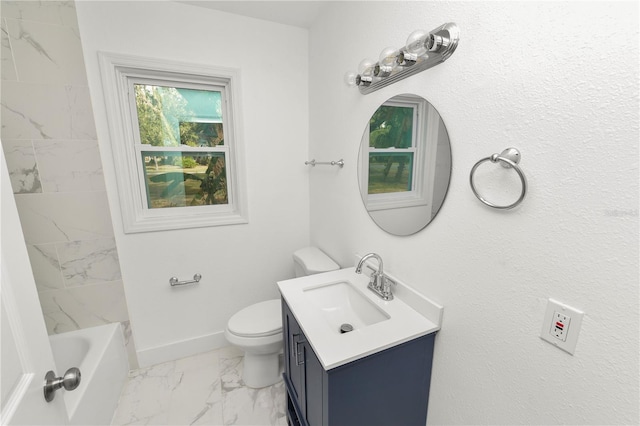 full bathroom featuring vanity, toilet, and tiled shower / bath combo