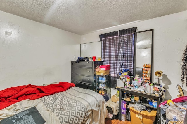 bedroom with a textured ceiling