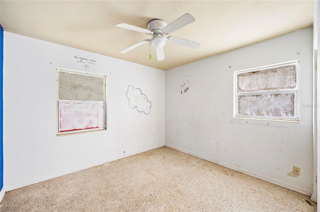 spare room featuring ceiling fan