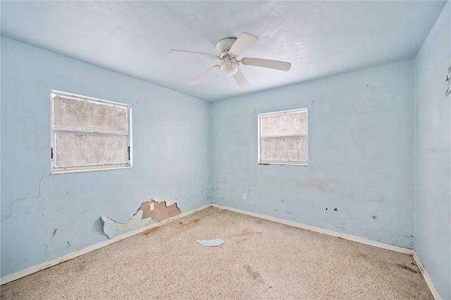 spare room featuring ceiling fan