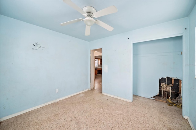 unfurnished bedroom featuring ceiling fan