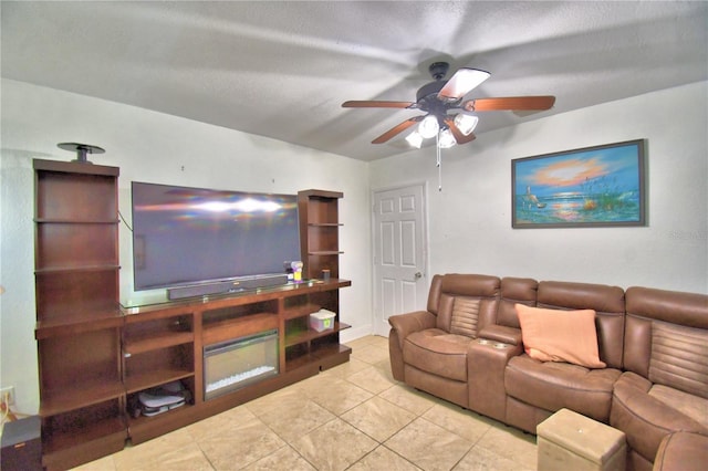 tiled living room with ceiling fan