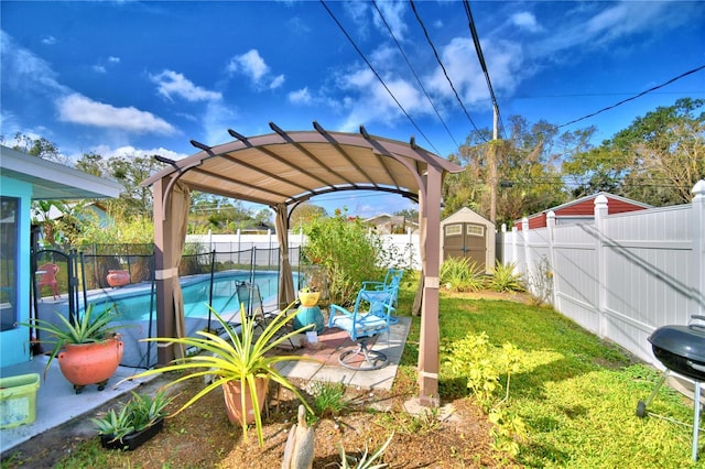 view of yard featuring a fenced in pool, a pergola, a patio, and a storage shed