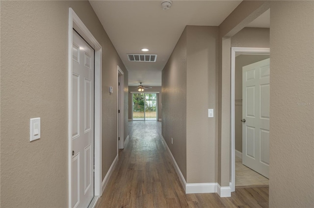 hall featuring light hardwood / wood-style floors