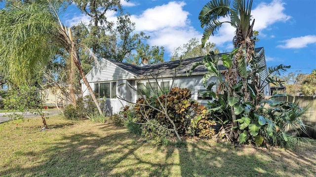 view of property exterior featuring a yard