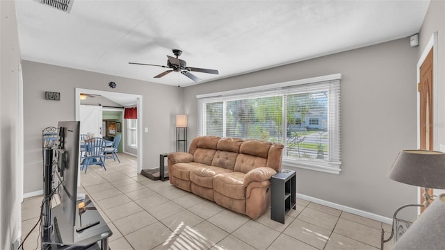 living room with light tile patterned flooring and ceiling fan