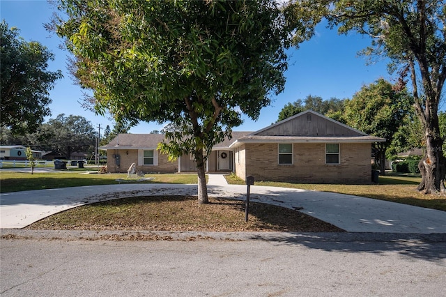 ranch-style house with a front yard