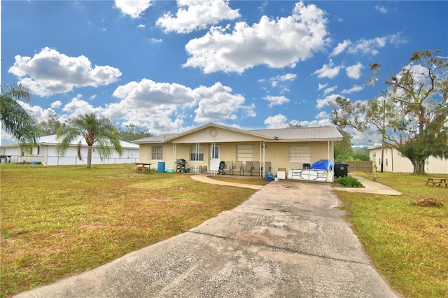 view of front of home with a front lawn