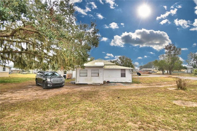 exterior space featuring a yard