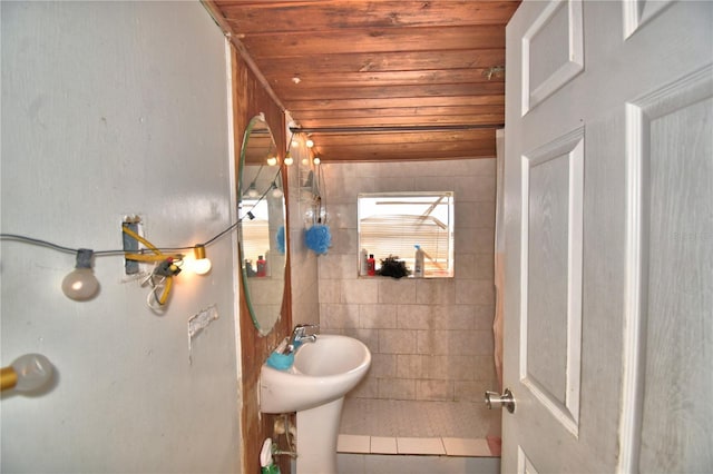 bathroom featuring wooden ceiling and walk in shower