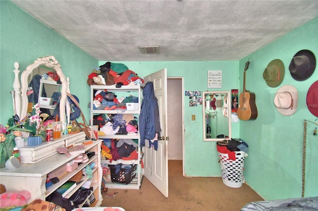 bedroom featuring a textured ceiling