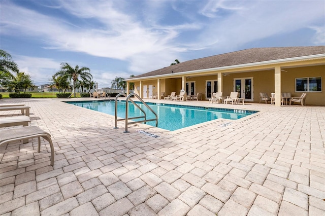 pool featuring a patio area and ceiling fan