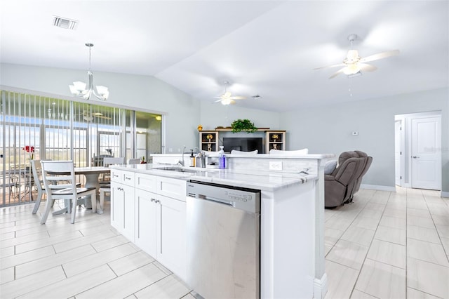 kitchen featuring visible vents, hanging light fixtures, stainless steel dishwasher, open floor plan, and white cabinetry