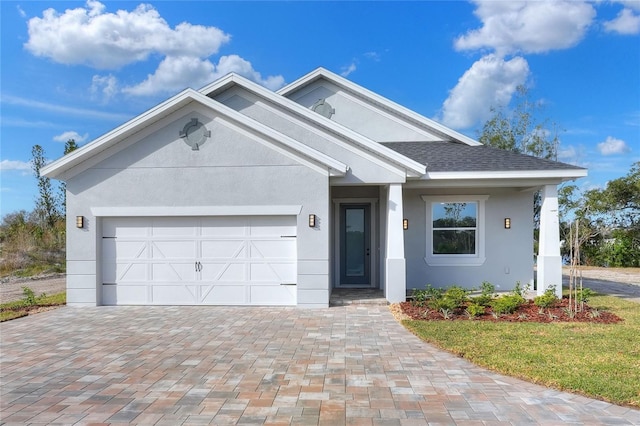 view of front of property featuring a garage