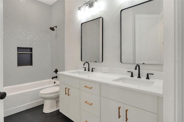 full bathroom featuring tile patterned flooring, shower / bathing tub combination, vanity, and toilet