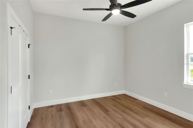 spare room featuring ceiling fan and light hardwood / wood-style flooring