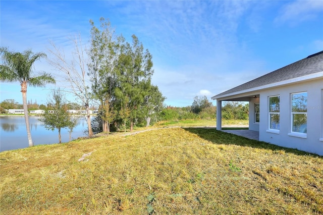 view of yard with a water view