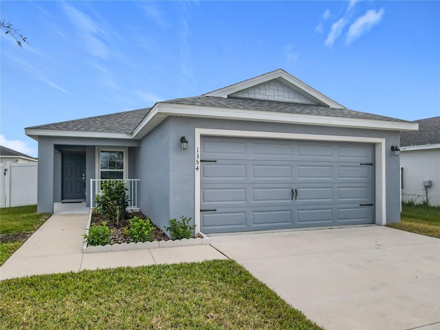 single story home featuring driveway, a shingled roof, an attached garage, and stucco siding