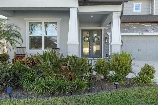 doorway to property featuring a garage