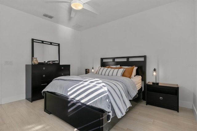 bedroom with light wood-type flooring and ceiling fan