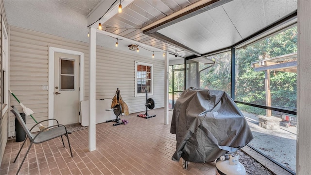 sunroom featuring plenty of natural light