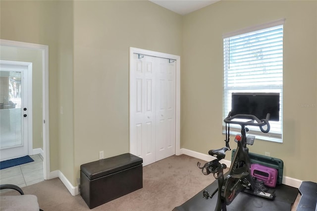 workout room with light carpet