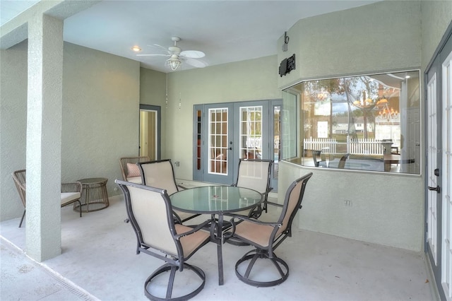 sunroom with ceiling fan and french doors