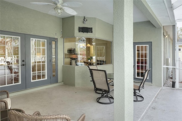 view of patio / terrace featuring french doors and ceiling fan