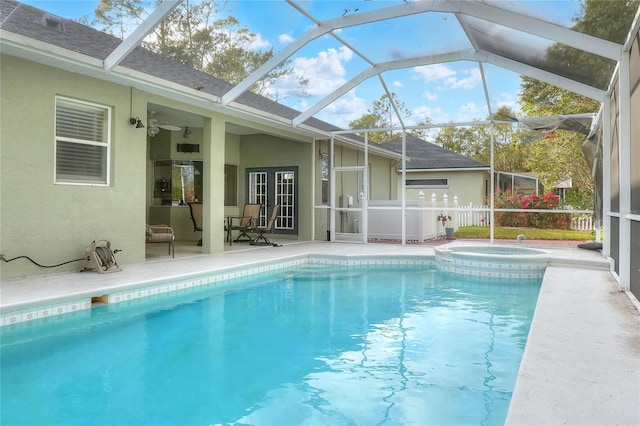 view of pool featuring a lanai, ceiling fan, and a patio